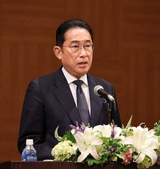 総裁選出馬、明言せず＝首相「開かれた選挙を」